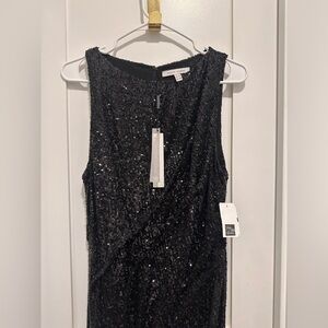 Black sequin evening gown, $1,800 original price. Rachel Gilbert